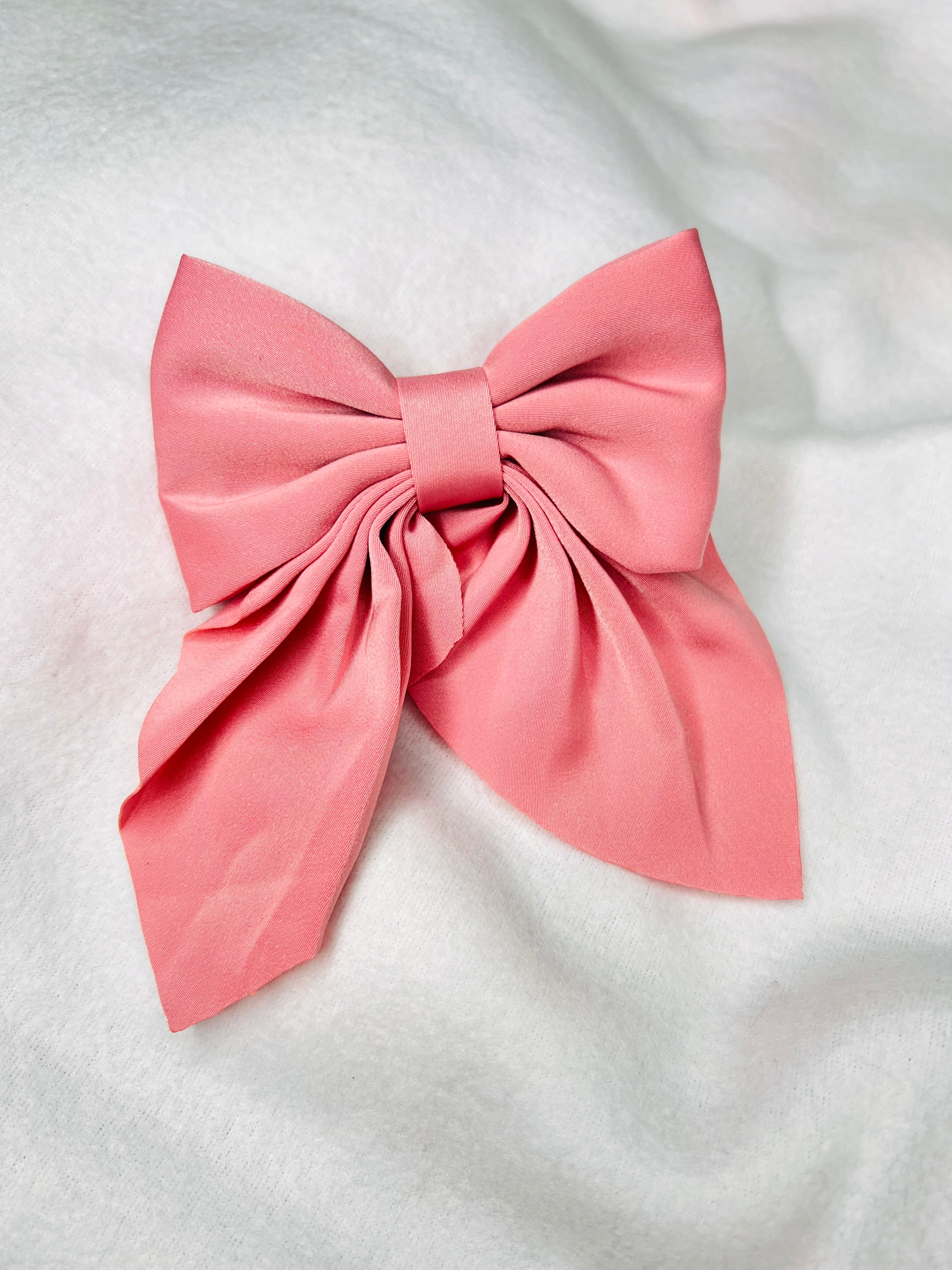 Pink alligator clip bow