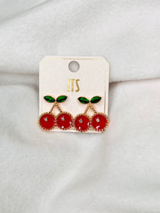 Cherry gold rimmed studs